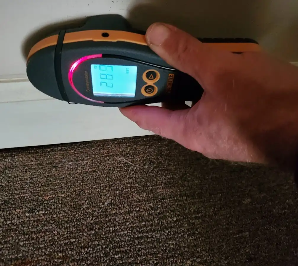 Moisture detection at baseboard during Burst Pipe Cleanup in Kapaa